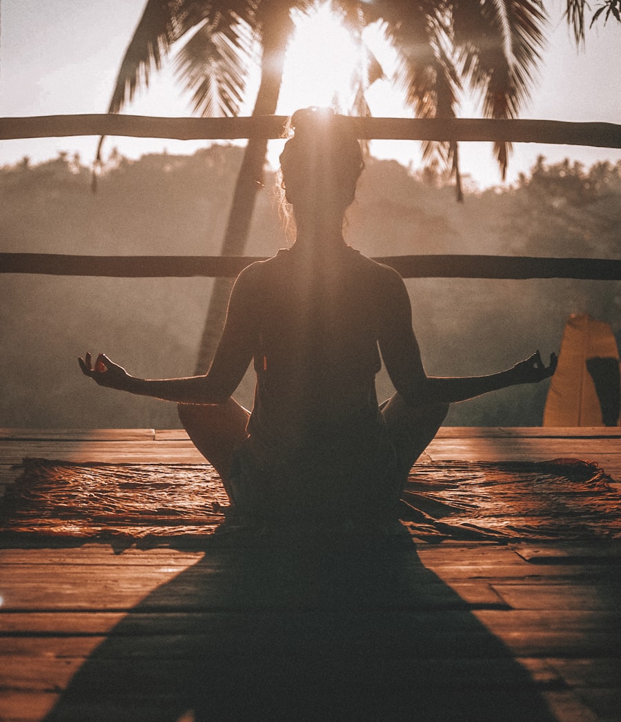 Woman practicing yoga outdoors